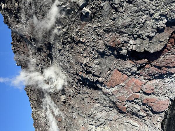 Color photograph of a wall of rock 