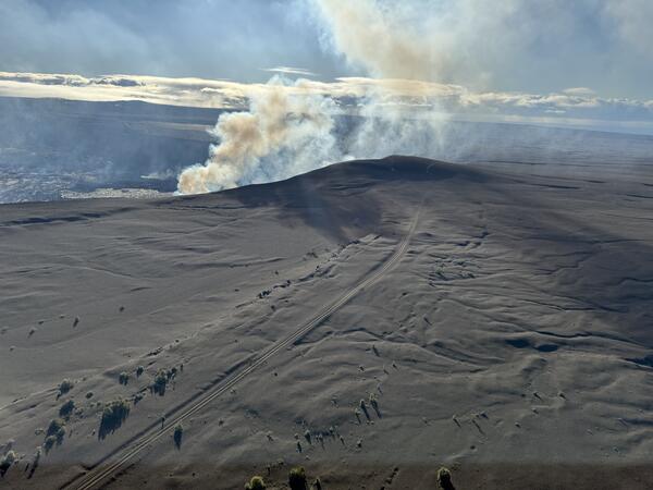 Color photograph of degassing volcanic vent 