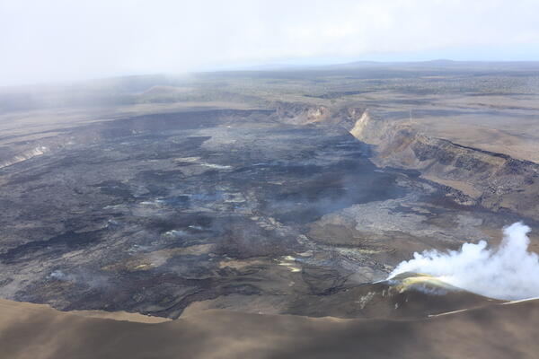 View of volcanic vents degassing within crater