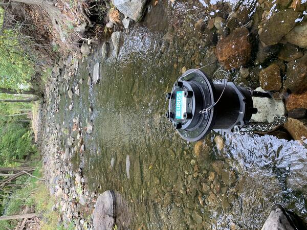 Scientific instrument sitting in a river