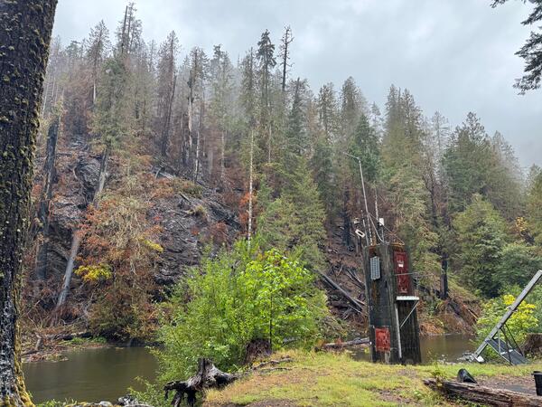 Streamgage by burned hillside