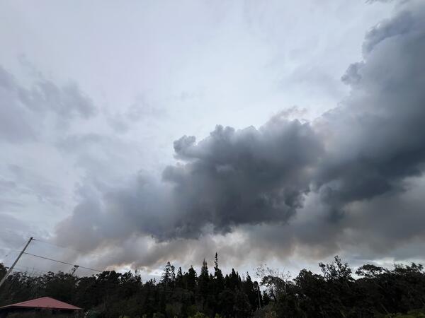Color photograph of eruptive plume