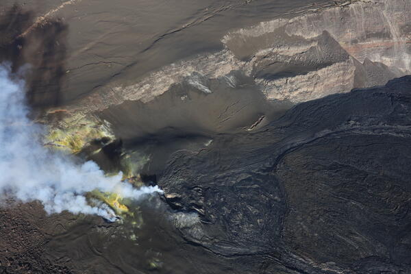 Color photograph of volcanic vents degassing