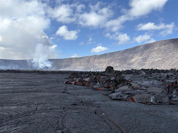 Color photograph of lava flows and eruptive vents