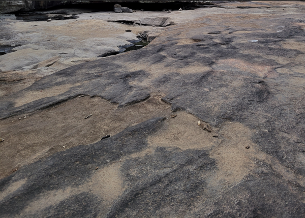 Image of a large, flat rock outcropping in Georgia. 