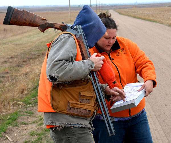 A pheasant hunter being interviewed 
