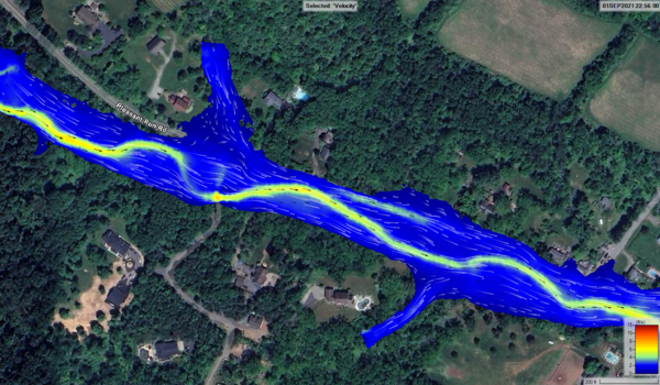 Aerial map of a section of river overlaid with defined flooding zones extending into the surrounding areas