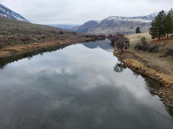 River with mountains in background