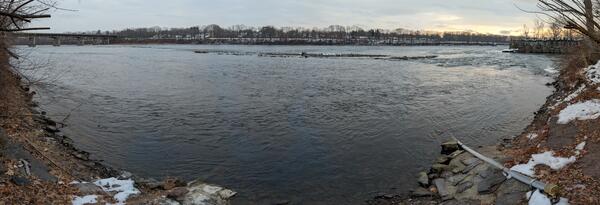 A wide angle view of a river during winter.