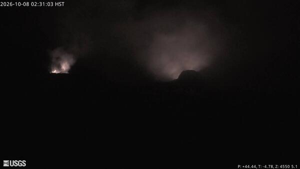 Color photograph of volcanic vents glowing at night