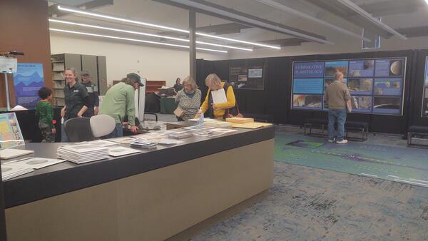 Visitors attend the USGS Open House in the Astrogeology Science Center, Nov 2023