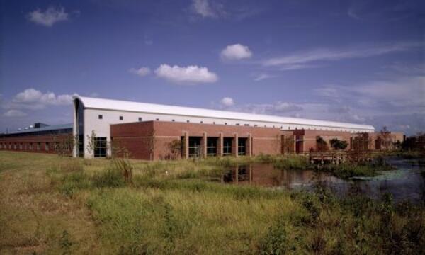 image shows the National Wetland and Aquatic Research Center when it was newly built in 1992