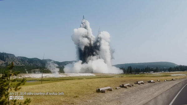 Hydrothermal Explosion in Yellowstone's Biscuit Basin (July 23, 2024) Large cloud of smoke and rock rising from the air.