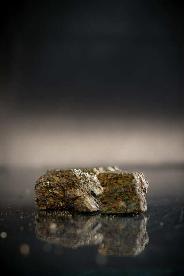 High-definition image showing metallic texture and layered structure.