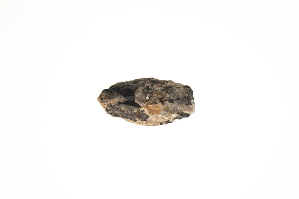 High-definition image of a second columbite-tantalite specimen, showing its dark coloration, rough surface.