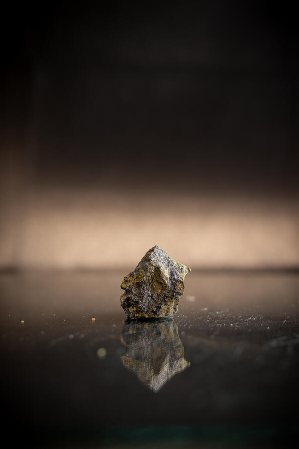 High-definition image of covellite with pyrite, showing the deep blue iridescence of covellite.