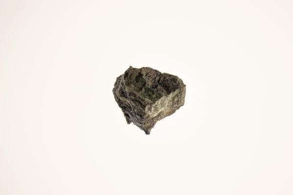  Isolated mineral specimen featuring covellite and pyrite, captured in high resolution.
