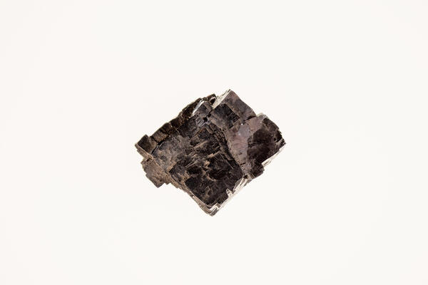 High-definition image of galena specimen showing crystal faces and silvery-gray color.