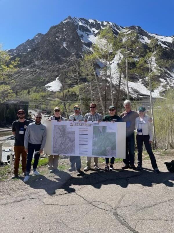 People holding a poster