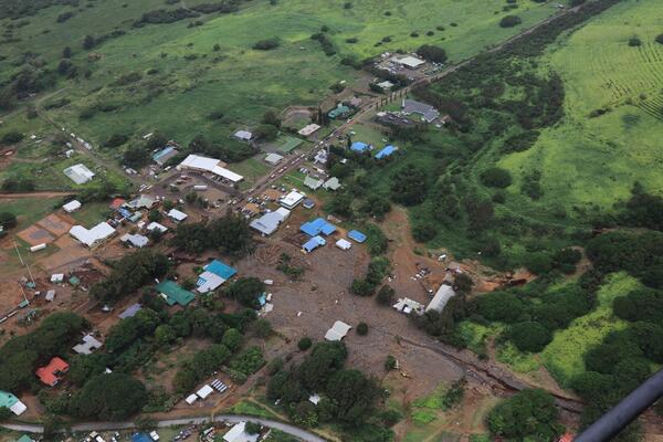Photo of buried homes/buildings upstread of culvert 