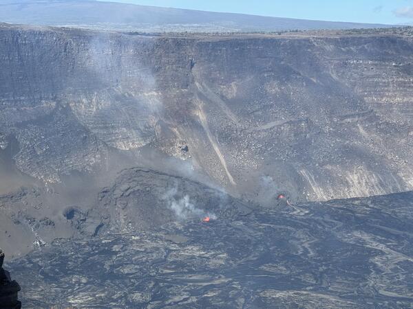 Color photograph of eruptive vent in a caldera