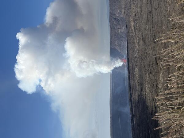 Color photograph of volcanic plume