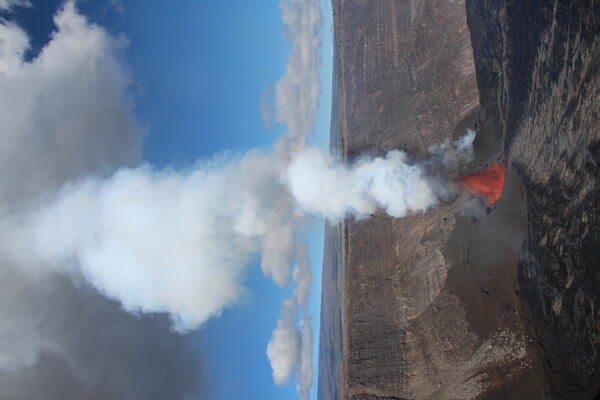 Color photograph of eruption plume rising in the air
