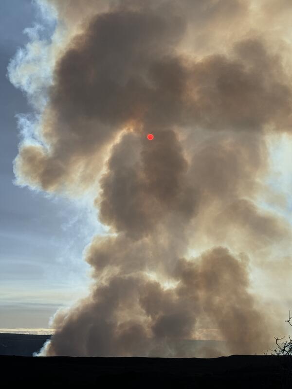 Color photograph of volcanic plume