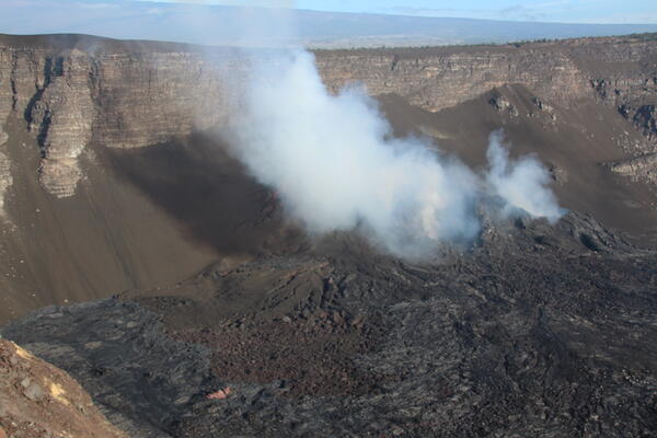 Color photograph of degassing volcanic vents