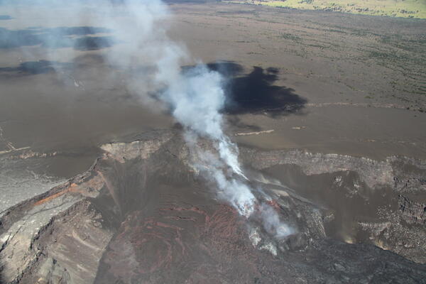 Color photograph of volcanic vent degassing