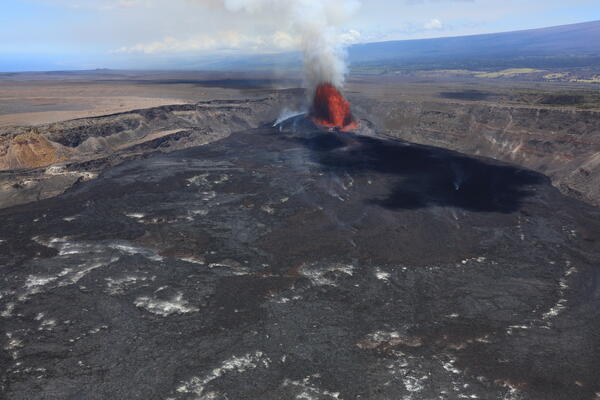 Color photograph of lava fountaining within a caldera