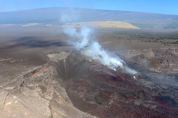 Color photograph of volcanic eruptive vents in crater
