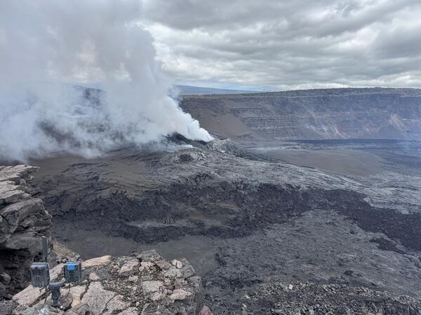 Color photograph of volcanic vents degassing
