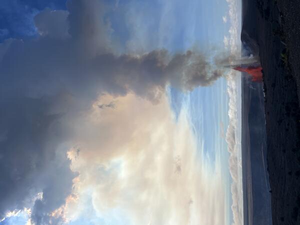 Color photograph of lava fountaining within caldera