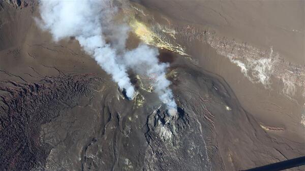 Color photograph of volcanic vents degassing