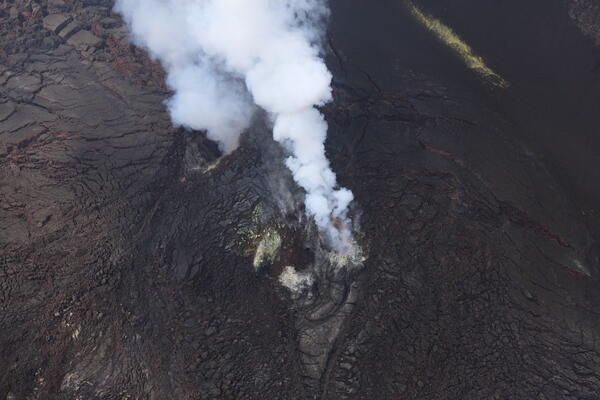 Color photograph of volcanic vents degassing