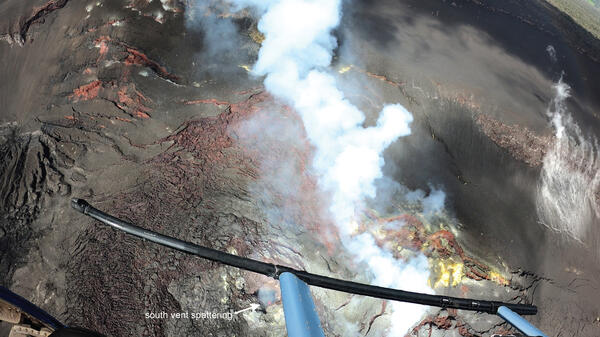 Color photograph of volcanic vent degassing