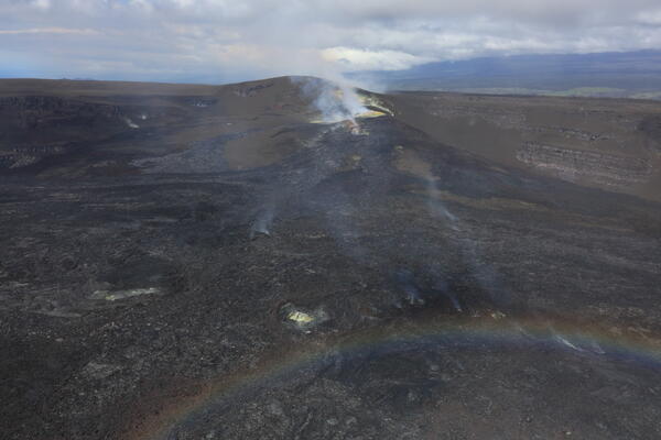 Color photograph of volcanic vents degassing