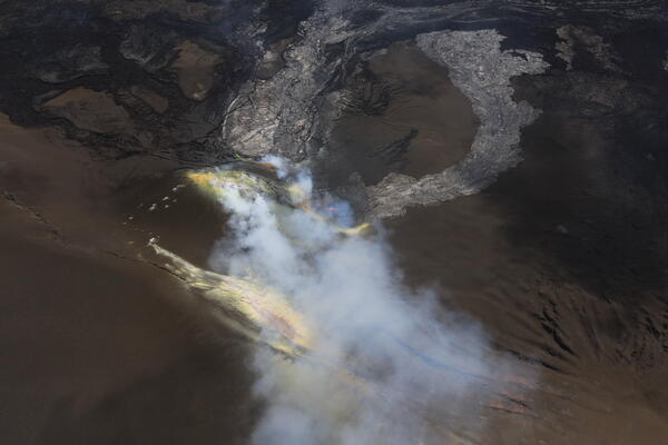 Color photograph of volcanic vents degassing