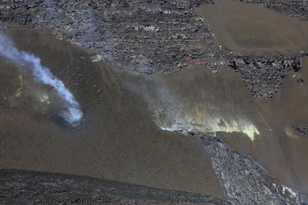 Color photograph of volcanic vents in crater wall