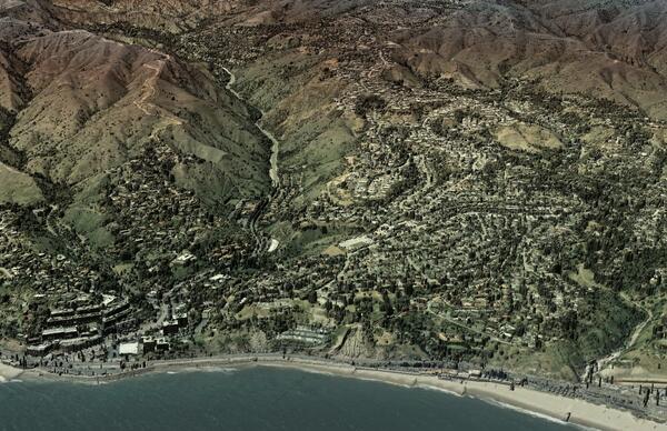 Lidar-derived DSM of the Palisades fire, with semi-transparent imagery overlaid