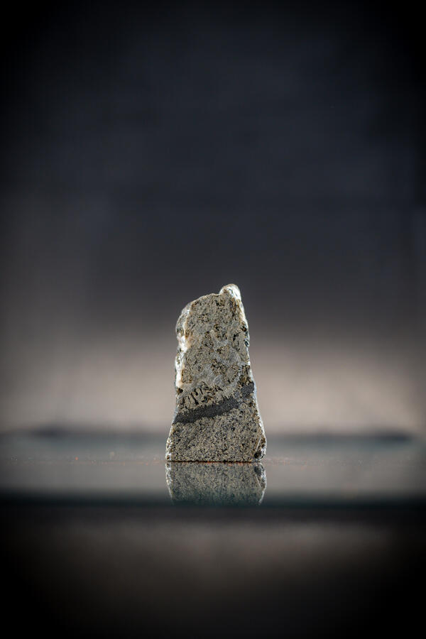 USGS mineral specimen showing chromite band in gabbro with platinum content.