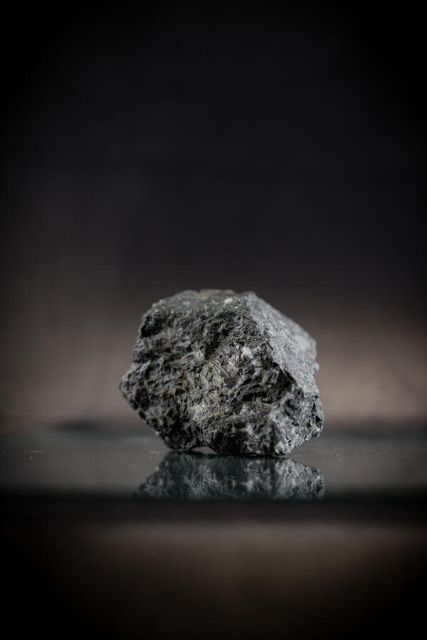 High-definition image showing coarse-grained texture and dark coloration.