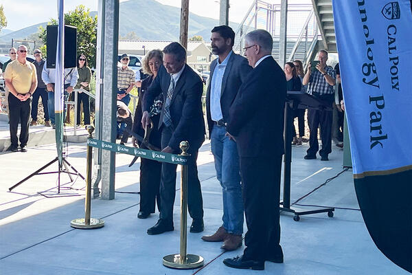 Ribbon cutting by Jim Dunning, Associate Executive Director of Cal Poly Partners. 