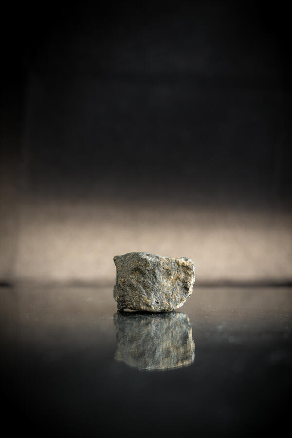 High-definition image of argentiferous tetrahedrite specimen with dark coloration and metallic inclusions.