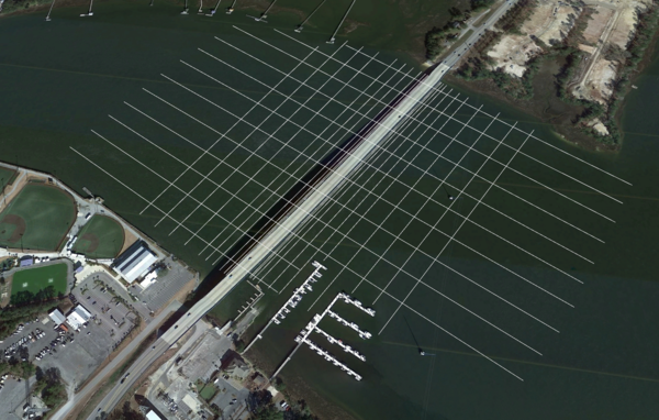 Arial view of riverbed measurements using a grid pattern, upstream and downstream of the bridge.