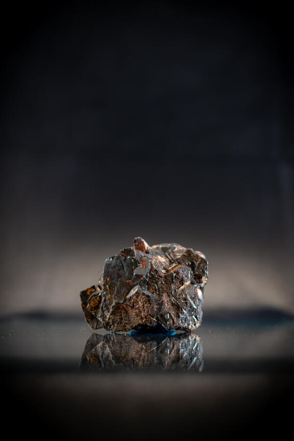 High-definition image of wolframite specimen with fine-grained texture and dark luster.