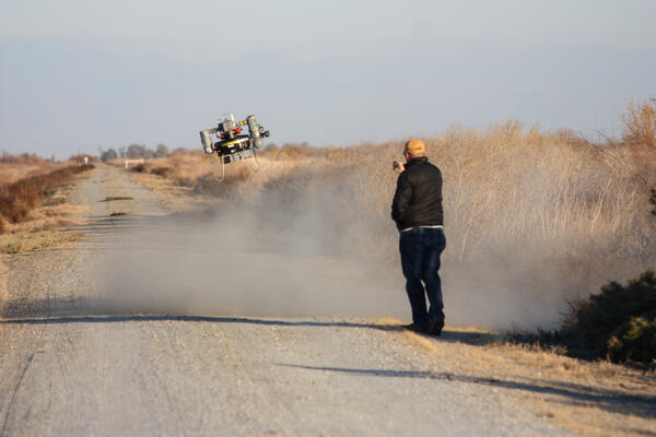 USGS scientist observing a UAS launch at the Pixley National Wildlife Refuge