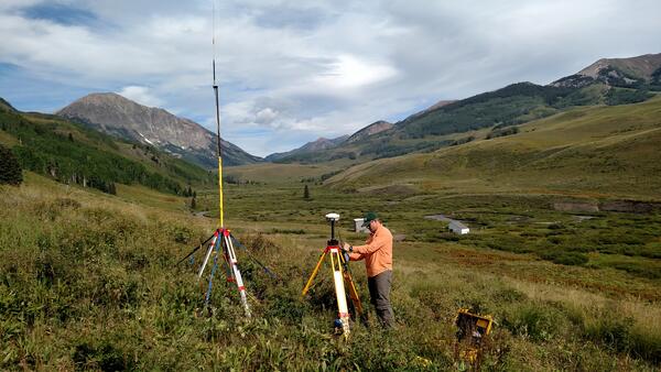 USGS scientist using RTK to establish ground control for a UAS mission