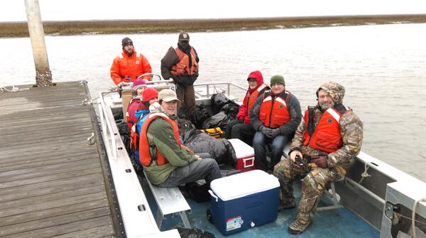 FWS staff leading a tour of the coastal marshes of Cape Romain NWR.